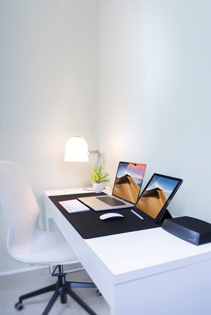Home Stylish home office desk with dual screens and minimalist decor. Perfect for remote work and productivity.